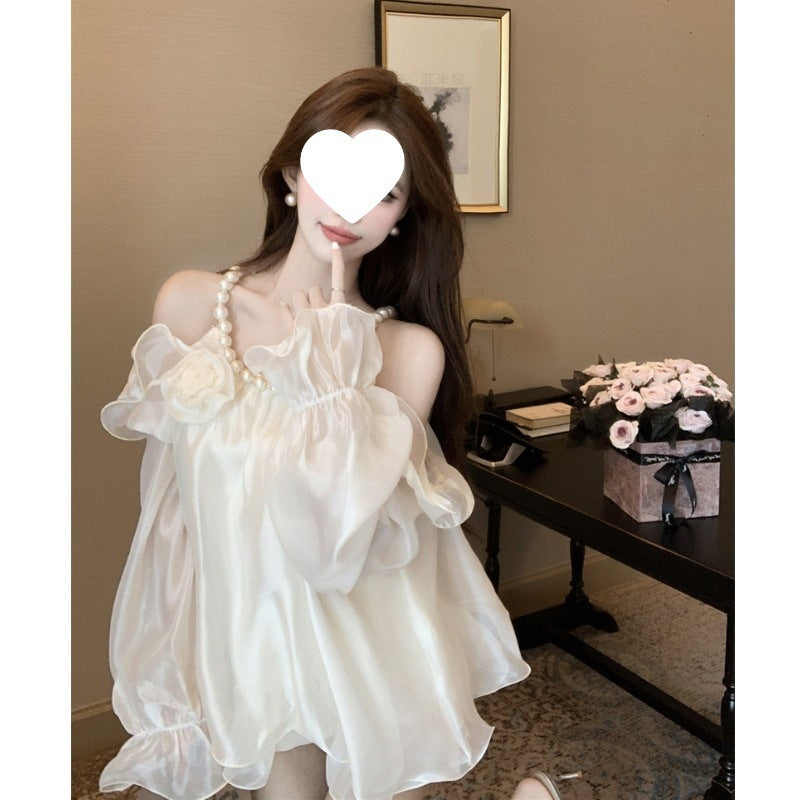 Dame Elegant Off-Shoulder Bluse med Rufflesleeves og floral accent Stilla