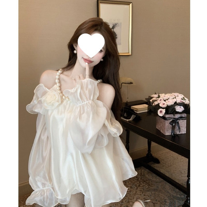 Dame Elegant Off-Shoulder Bluse med Rufflesleeves og floral accent Stilla