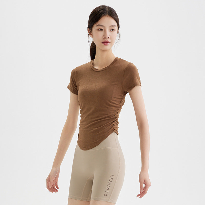 Dame sporty kortærmet top lavet af åndbart materiale med struktureret design Stilla