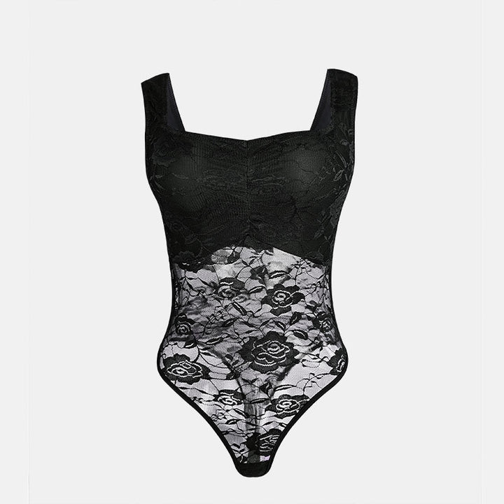 Dame spids-bodysuit med floral design og konturerende snit Stilla