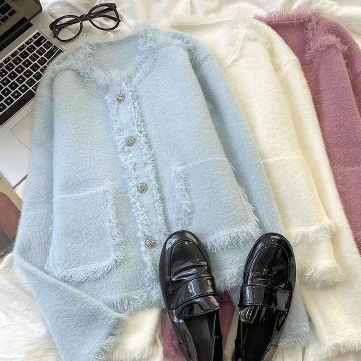 Kvinders elegante fleecejakke med fashionable knapdetaljer Stilla