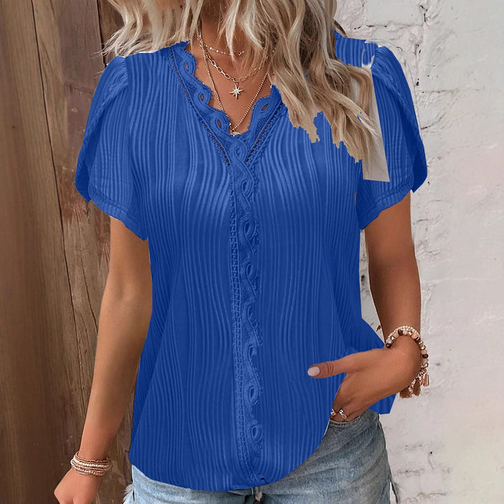 Damebluse med knapliste og spids Stilla