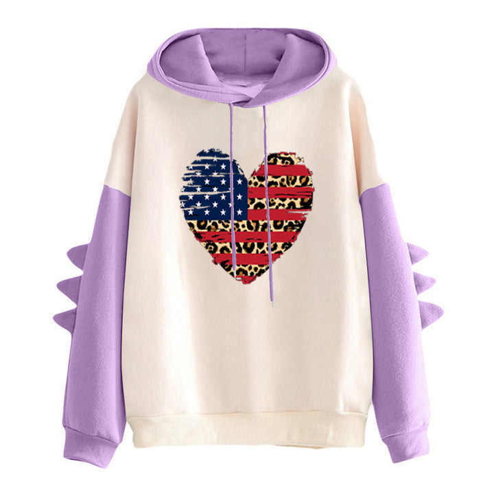 Dame hoodie med unikt hjerte design og trendy detaljer Stilla