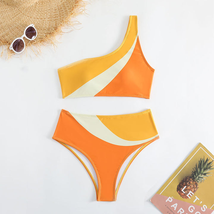 Dame bikini med asymmetrisk snit og livligt farvespil Stilla