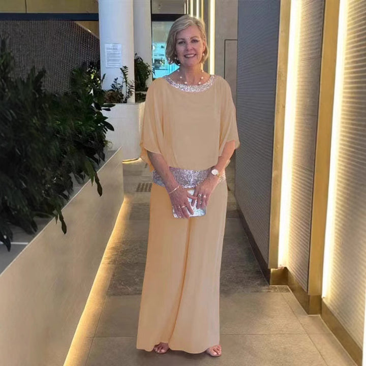 Dame Elegant kombi-outfit med flydende skær og glitrende accenter Stilla