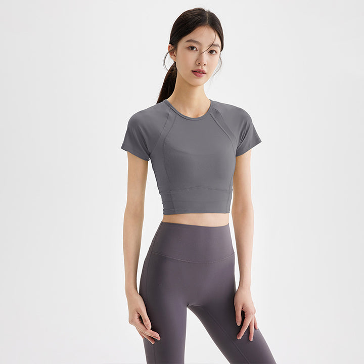 Dame sporty kortærmet crop-top med åndbare indsatser og elastisk pasform Stilla