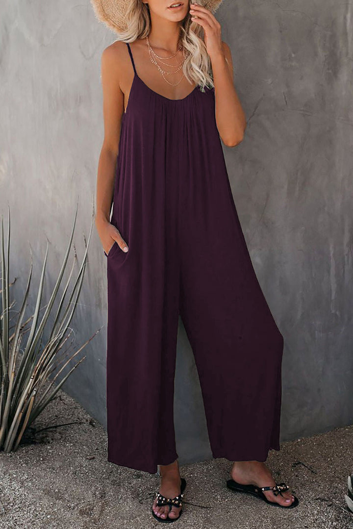 Dame afslappet maxi jumpsuit med justerbare spaghetti stropper og praktiske lommer Stilla