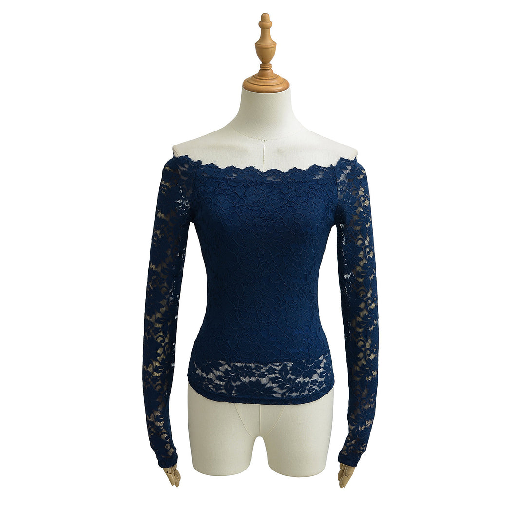 Dame spids top med flot off-shoulder look og sarte flæsedetaljer Stilla