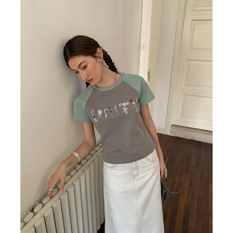 Dame T-shirt med unikt grafisk design og afslappet snit Stilla