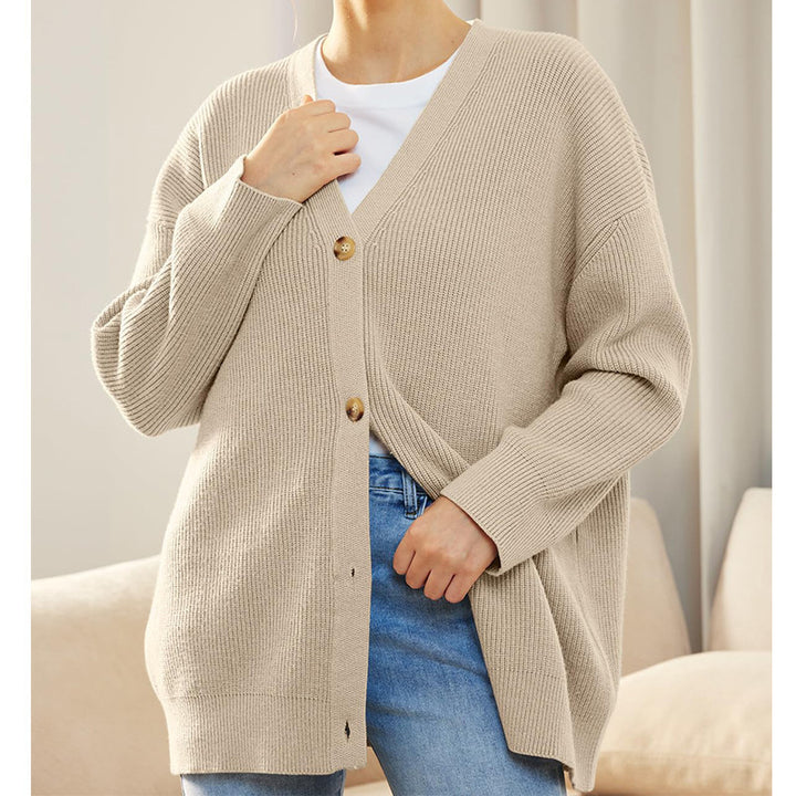 Dame strikjakke med oversized snit og knapdetaljer Stilla