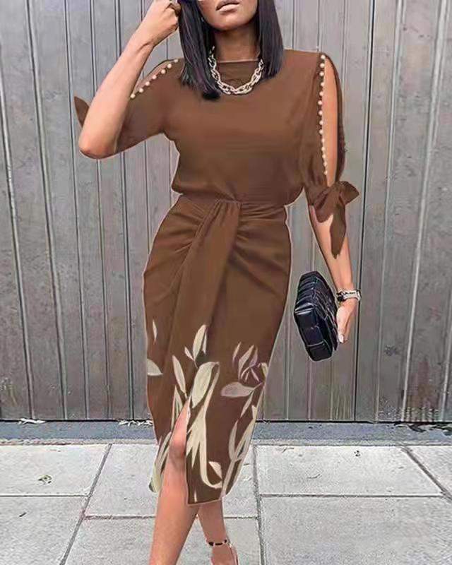Elegant midi-kjole til kvinder med stilfulde cut-out-ærmer Stilla