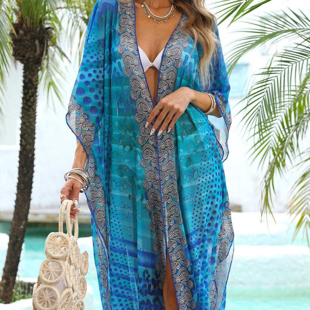 Dame elegant strandkimono med blomsterprint og gennemsigtig struktur Stilla