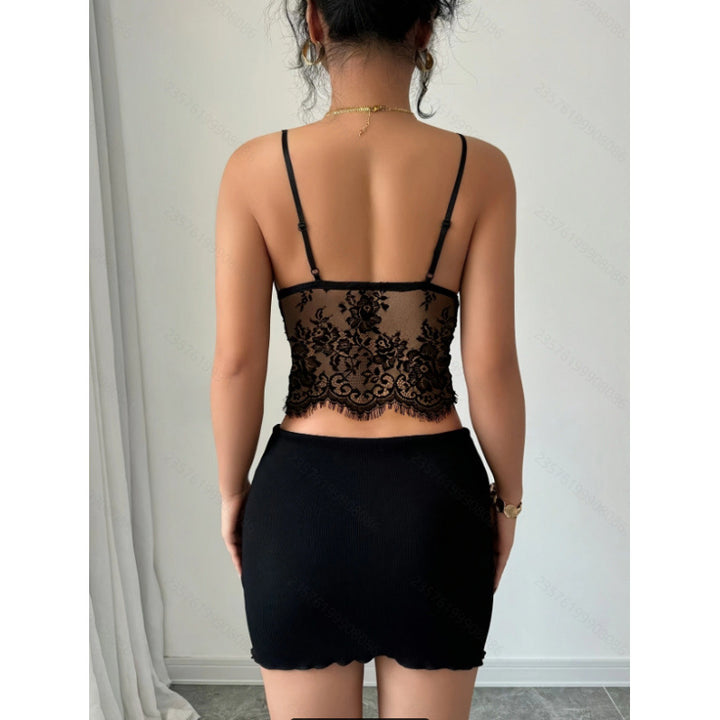 Dame spids-bustier med florale accenter og transparent stof Skovae