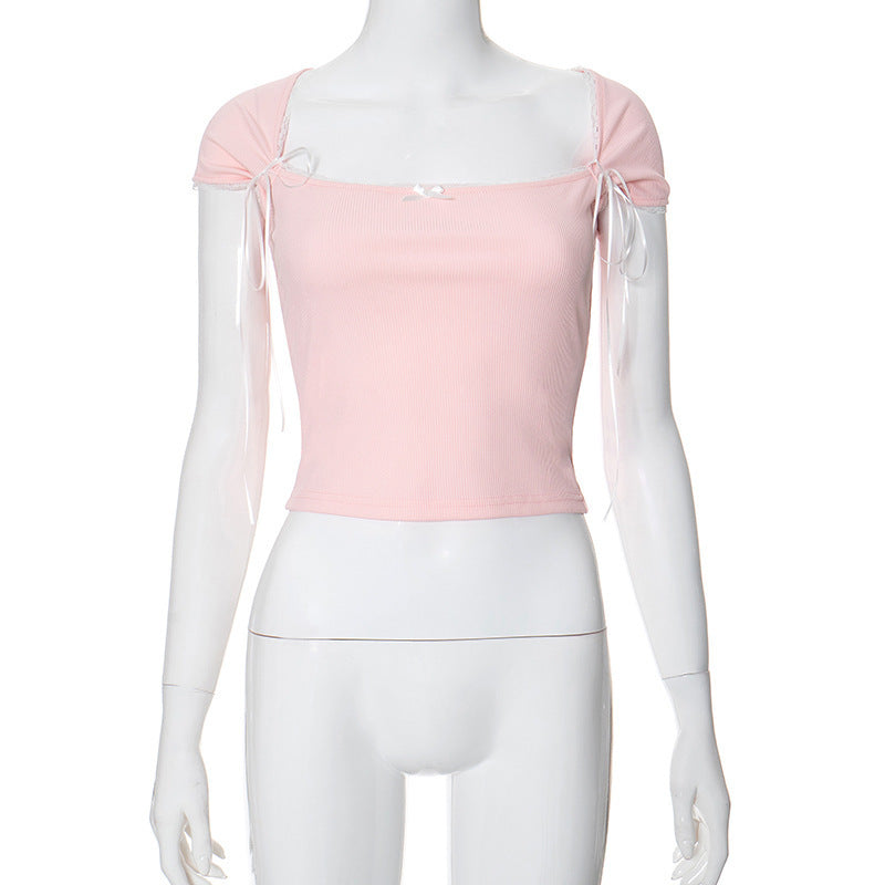 Dame Crop-top med justerbare spaghetti-stropper og elegante knude-detaljer Skovae