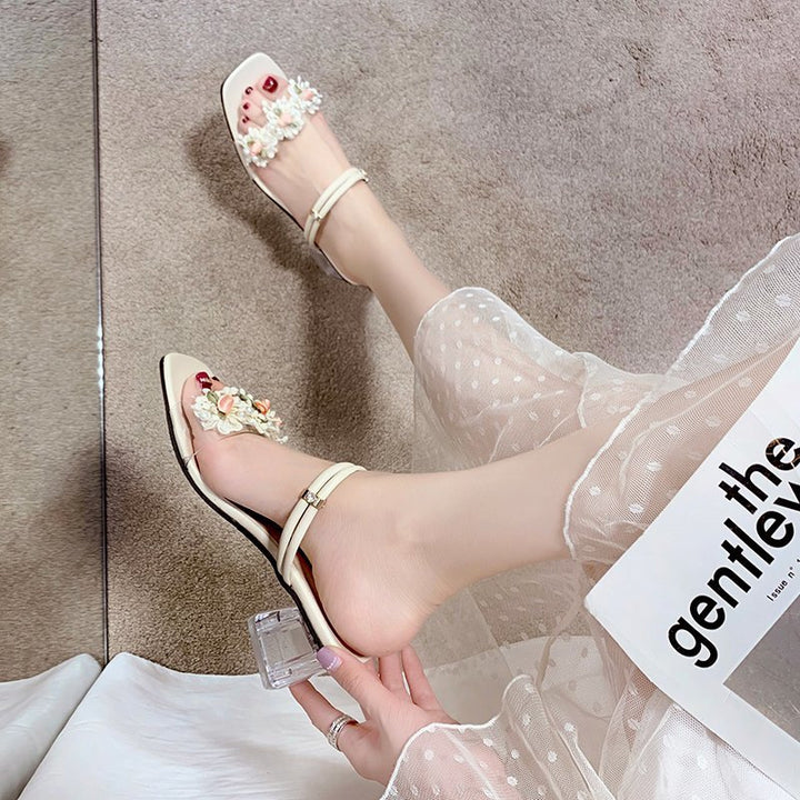 Dame Sandaletter med transparent rem og florale accenter Stilla