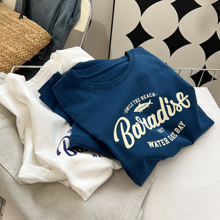 Dame T-shirt med begrundet Paradise-tryk og løs pasform Stilla