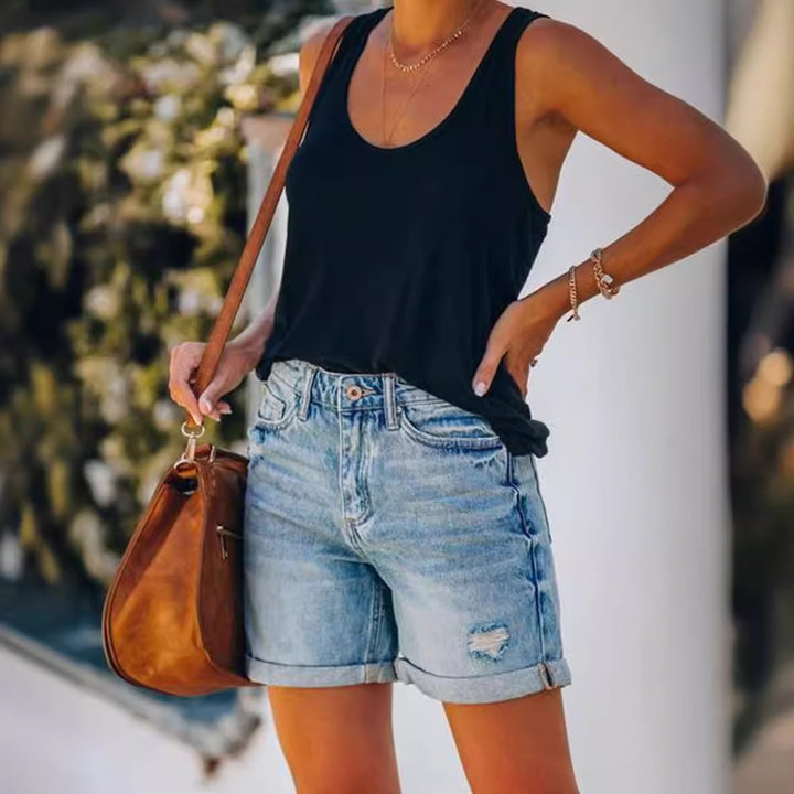Dame denim shorts med afslappet pasform og frynset afslutning Stilla
