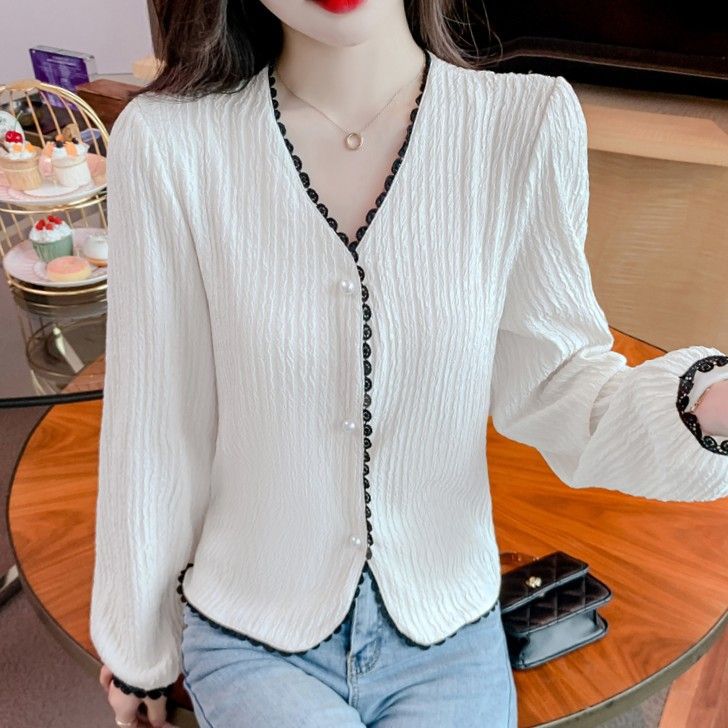 Kvinders bluse med fine lace accenter og elegant snit Stilla