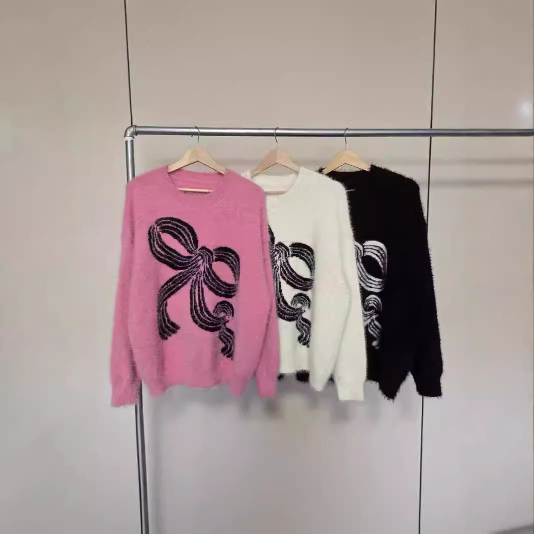 Kvindernes hyggelige sweater med dekorativ sløjfe mønster