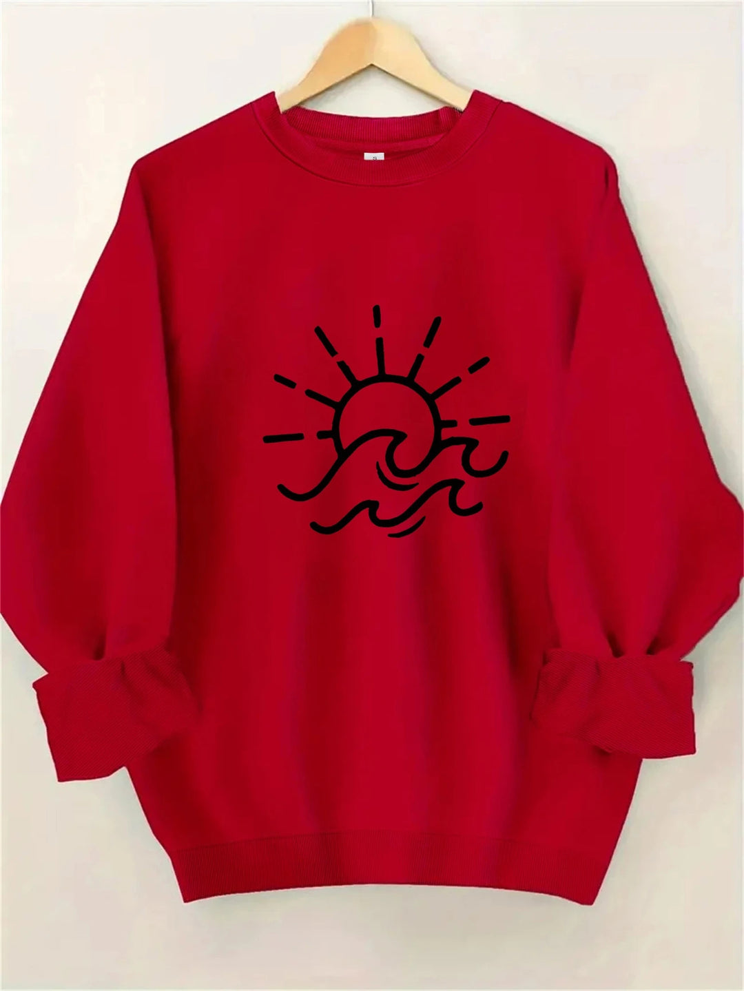 Kvinders sweatshirt med kreativt sol- og bølgedesign Stilla