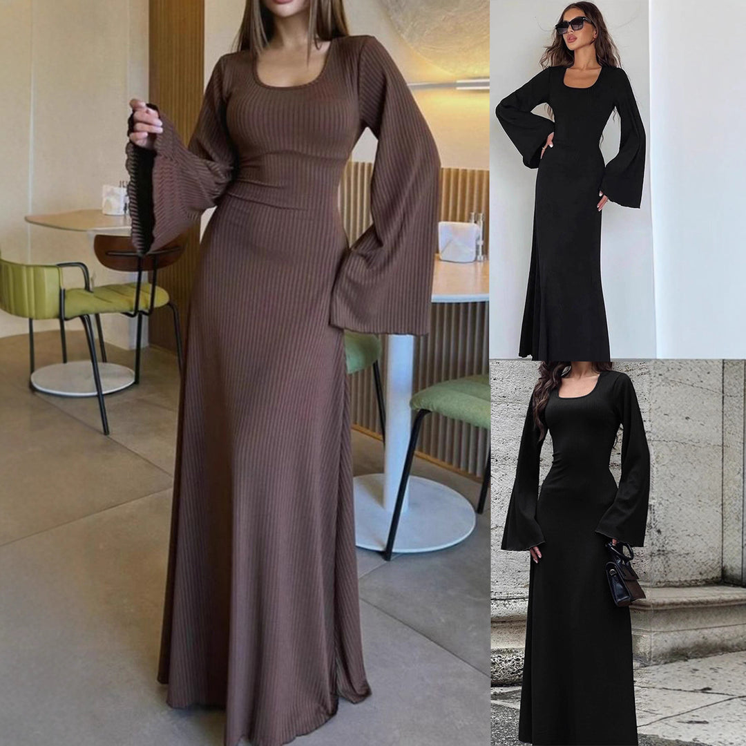 Dame maxi kjole med brede flared ærmer og elegante detaljer Stilla