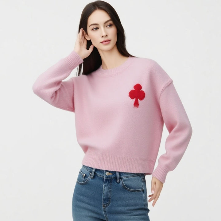 Dame mønsteret kort sweater lavet af blødt strikmateriale med det ikoniske Stilla-logo