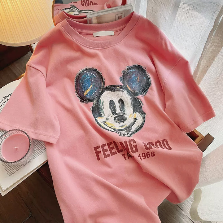 Dame T-shirt med kreativt Mickey Mouse design og afslappet snit Stilla