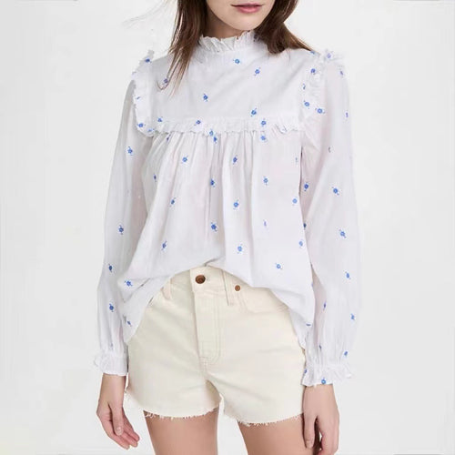 Dame blouse med voluminøse flæsedetaljer og florale broderier Stilla