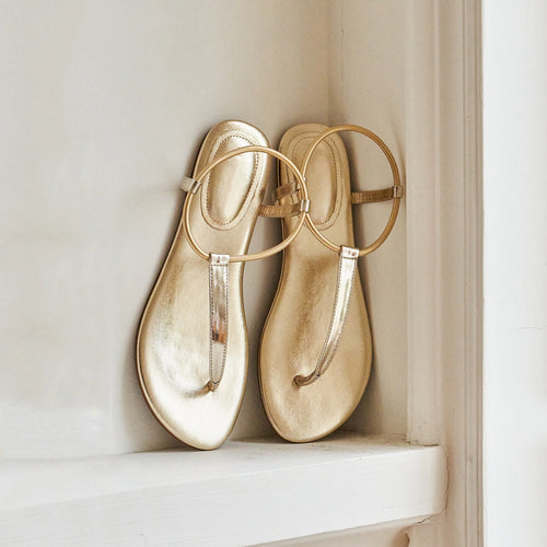 Dame elegante tofoderen med slank metallic rem design Stilla