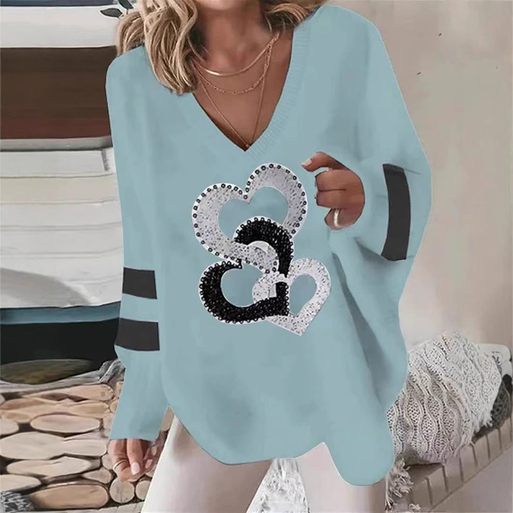 Dame hoodie med hjerte motiv og elegante kontraststriber Stilla