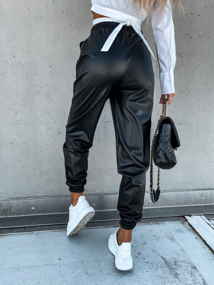 Dame komfortable joggebukser i sportstil med elastisk talje og lommer Skovae