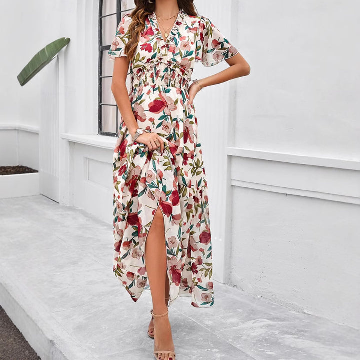 Dame maxikjole med blomsterprints og svungent snit Stilla