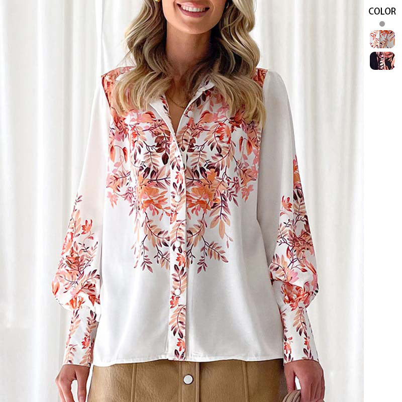 Dame elegant bluse med blomsteraccenter og moderne puffærmer
