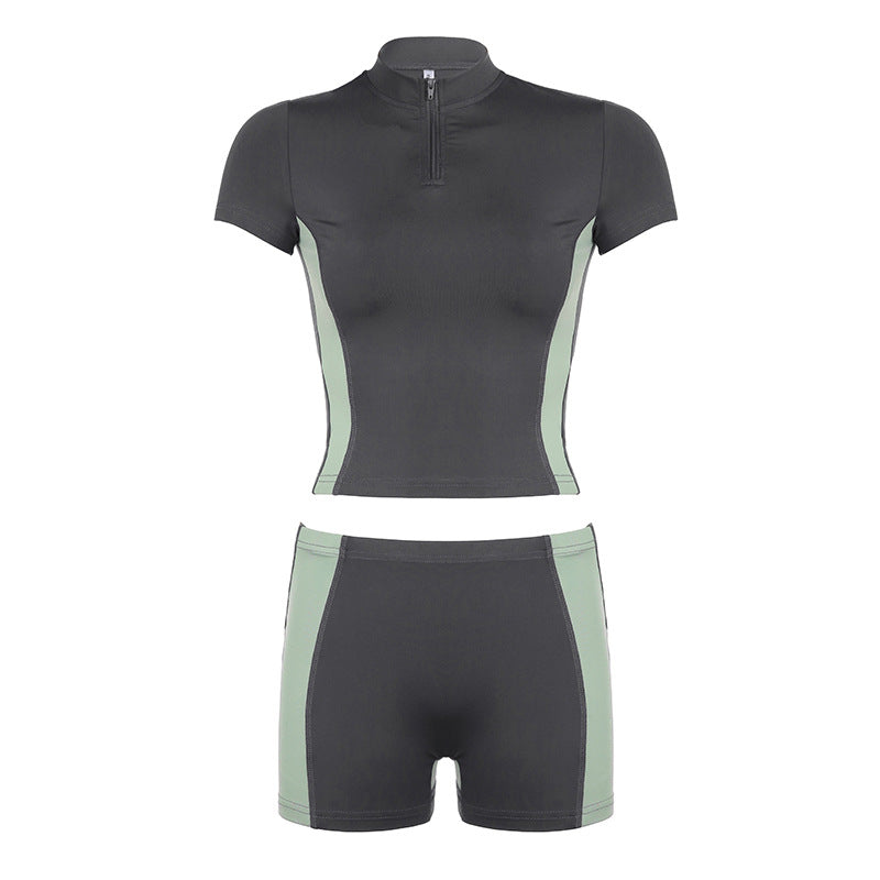 Dame Sporty kortærmet sæt med lynlås og moderne design Skovae