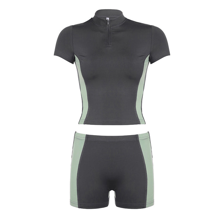 Dame Sporty kortærmet sæt med lynlås og moderne design Skovae