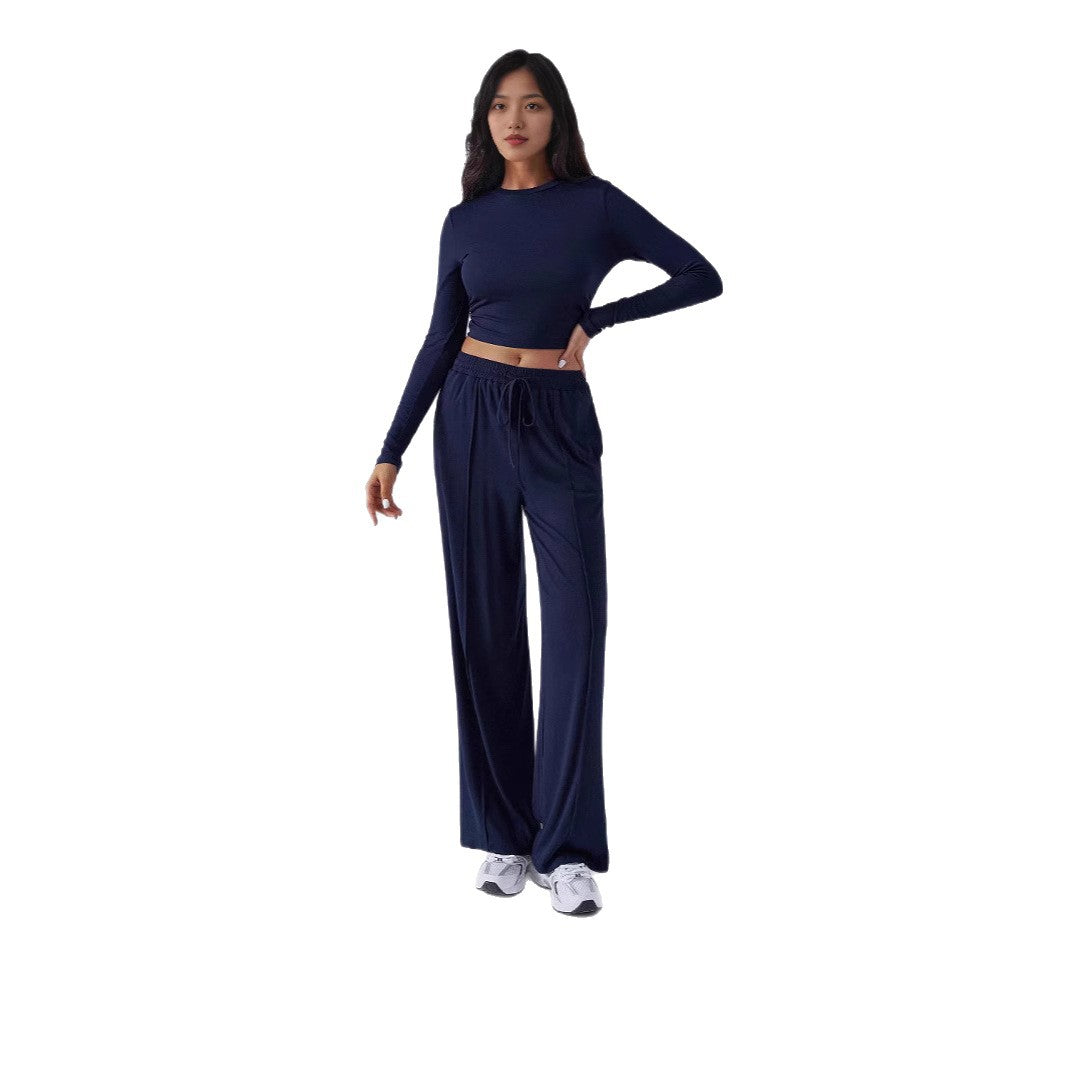 Dame Elegant lounge-outfit med stribet top og behagelige bukser Stilla