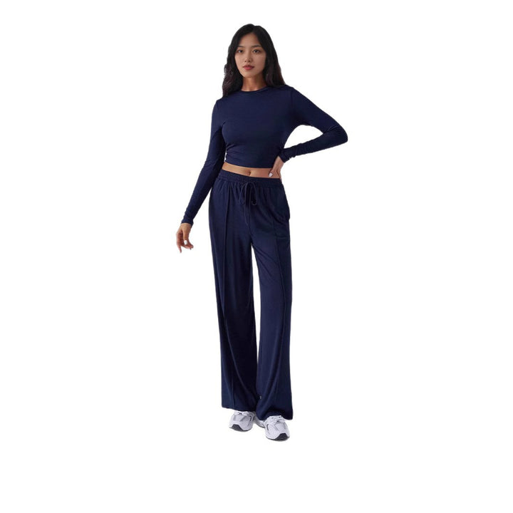 Dame Elegant lounge-outfit med stribet top og behagelige bukser Stilla