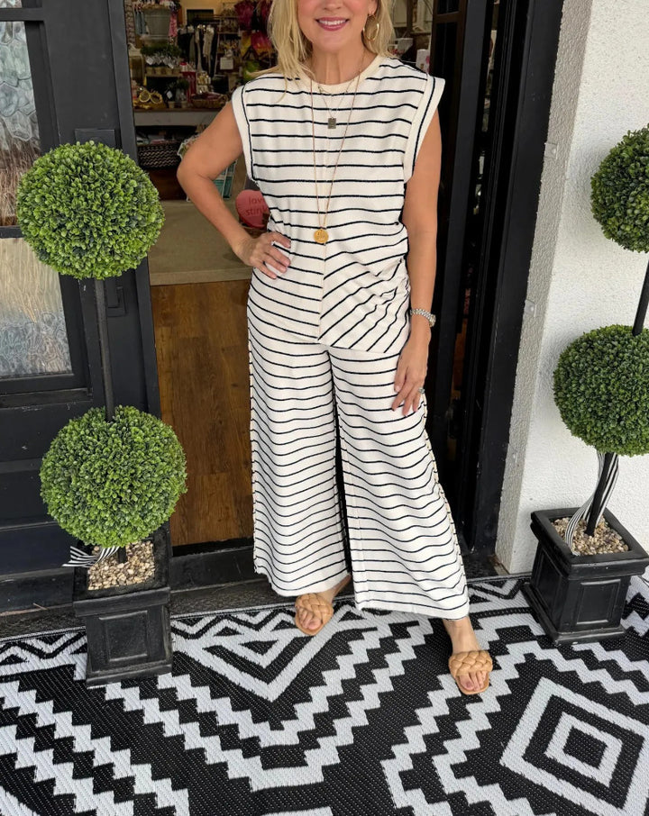 Dame stribet jumpsuit med bred ben og ærmeløst design Stilla