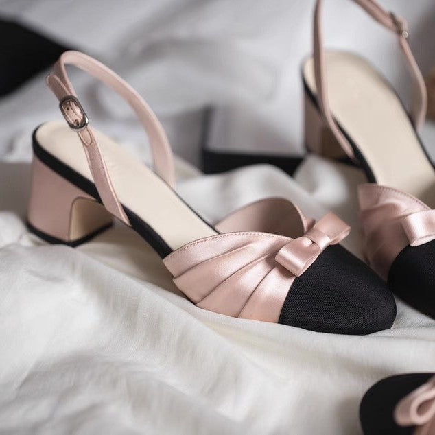 Dame Slingback-pumps med stram silhuet og fine satin-sløjfer Stilla