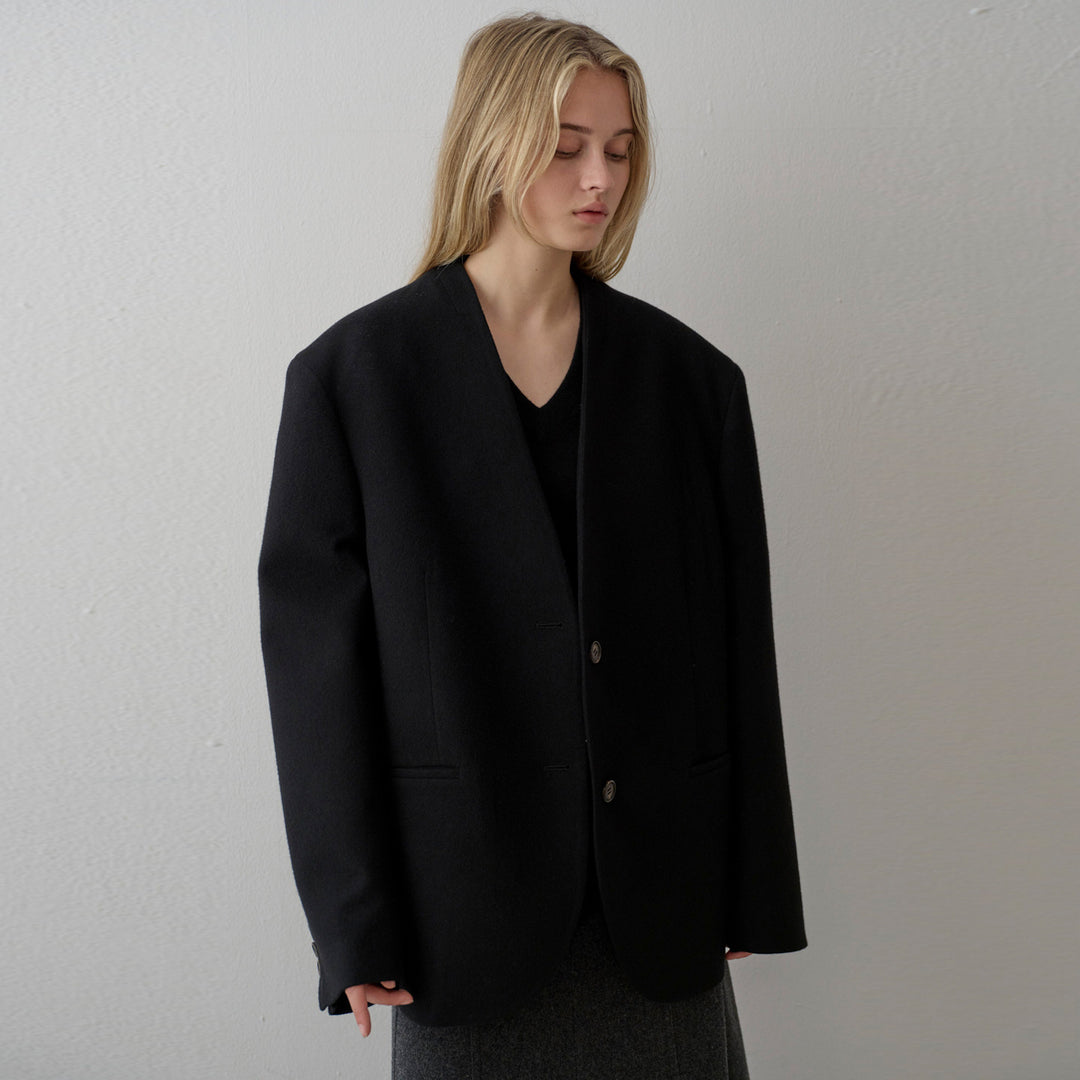 Kvinders elegante strikket blazer med asymmetrisk snit Stilla
