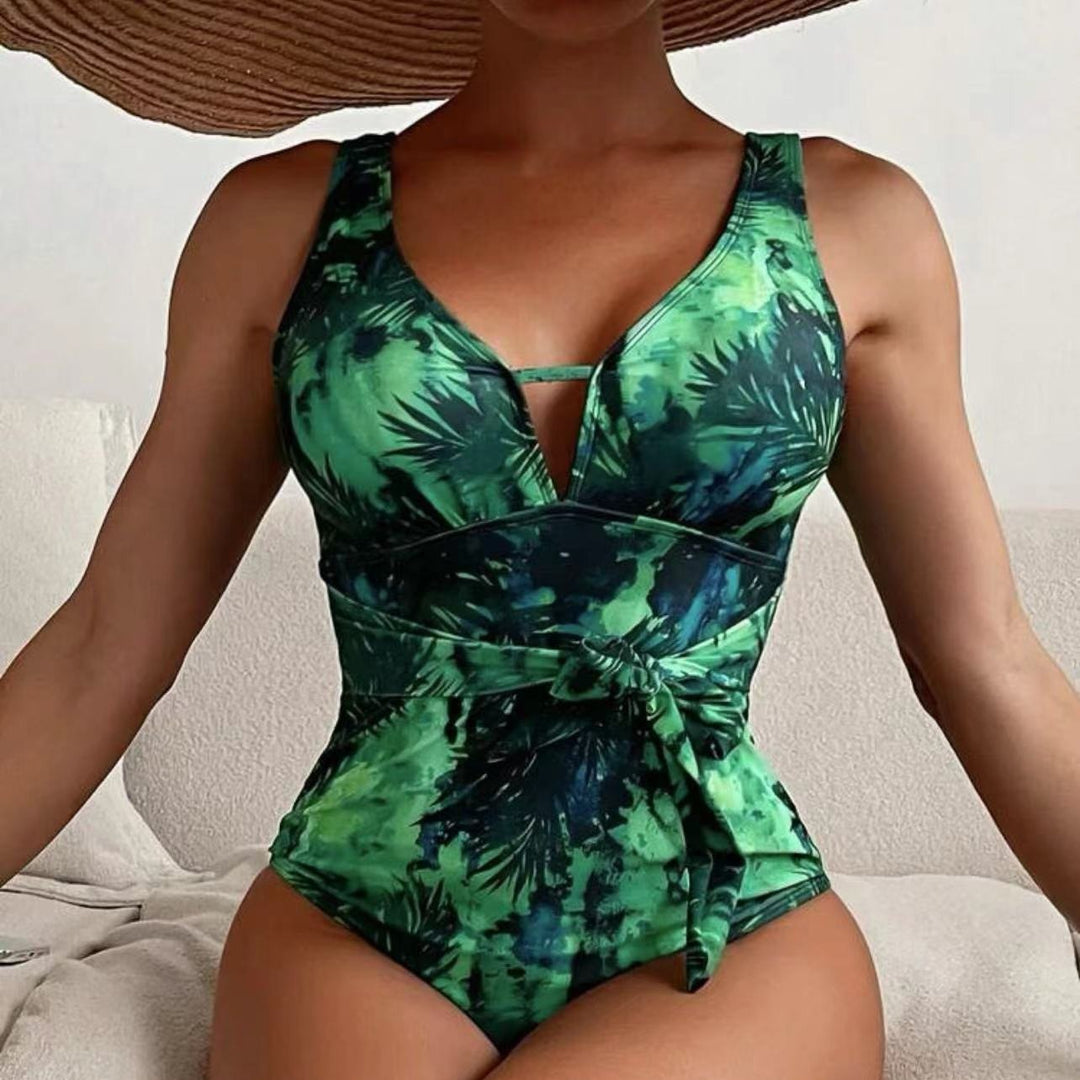 Dame one-piece badedragt med blomster indpakningsdetalje Skovae