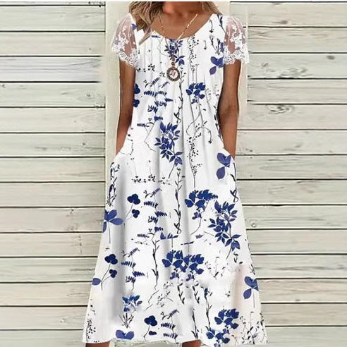 Dame sommerligt fritidskjole med spidsærmer og original blomstertryk Stilla