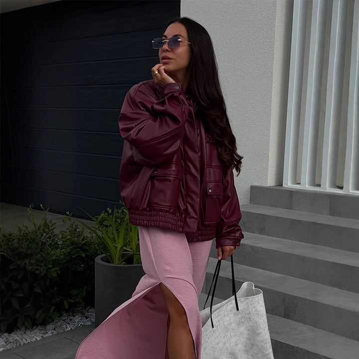 Dame oversized kunstlæderjakke med funktionelle lommer og elastisk bund Stilla