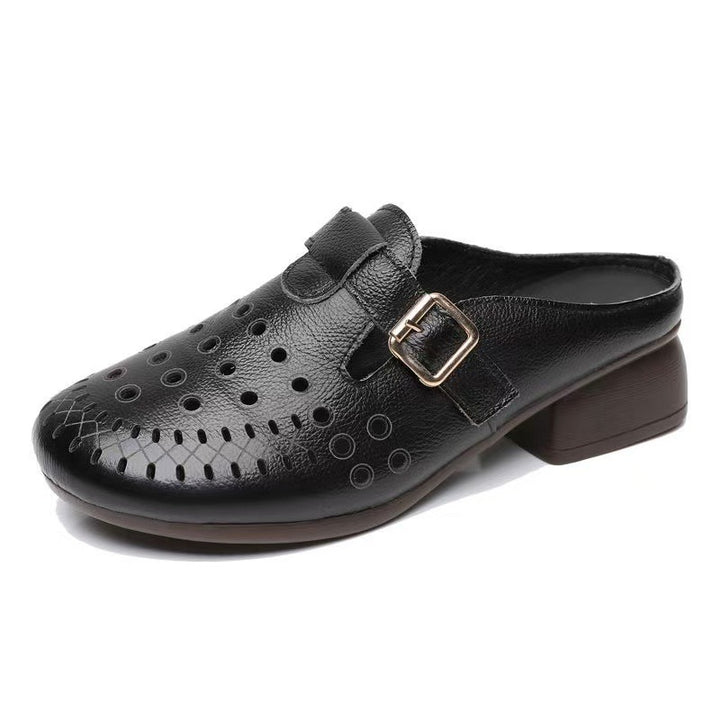 Dame Clogs med perforeret design og elegant spænde Stilla