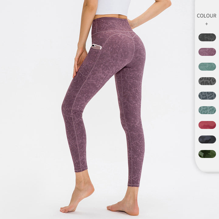 Dame Kvalitets Performance-Leggings med praktiske sidelommer og elastisk talje Stilla