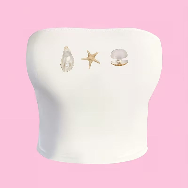 Dame bandeau-top i maritimt design med muslingformede motiver Skovae
