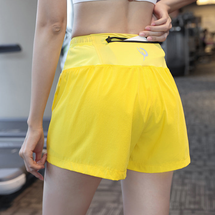 Dame Sporty Løbeshorts med sideventilation og elastisk talje Stilla