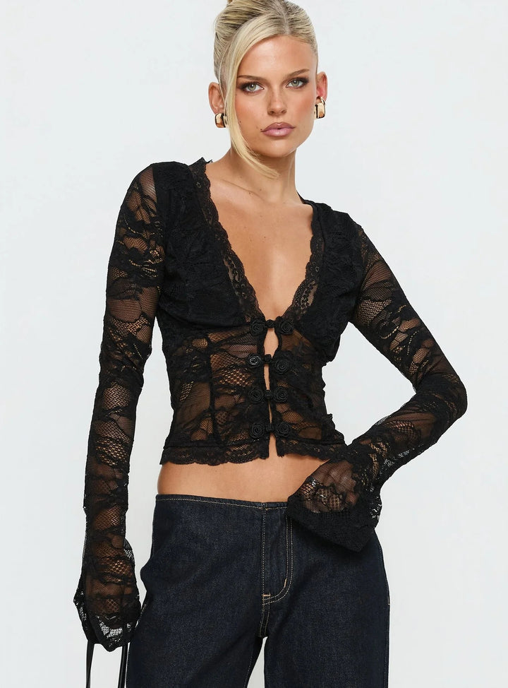 Dame bluse i lace med dyb V-hals og detaljerede knapper Skovae