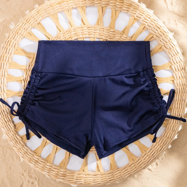 Dame Shorts-badedragt med justerbar talje og sportligt design Stilla