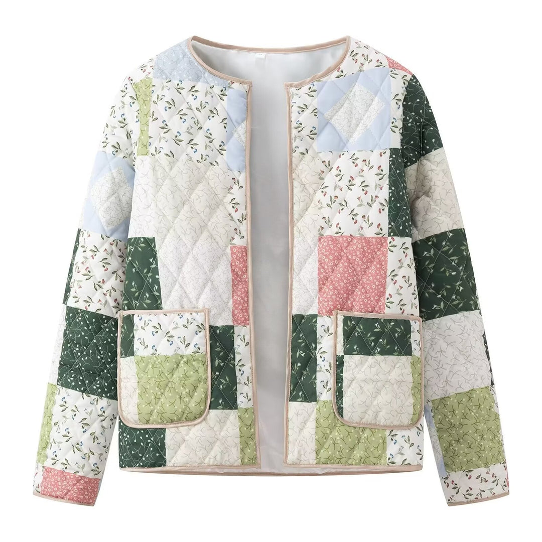 Dame quiltet patchworkjakke med blomstret design og praktiske lommer Stilla